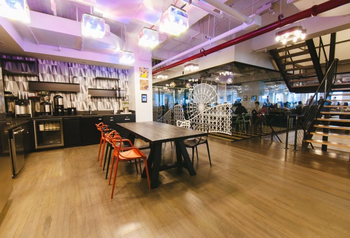 WeWork currently has its co-living platform, WeLive, in which NYC district? 